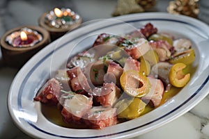 Deep fried octopus olive salad feast