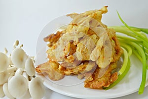Deep-fried oyster mushroom on dish