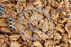 Deep fried pork liver with breading sold at a street food stall