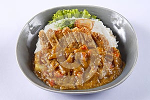 Deep fried pork with rice and curry sauce in japanese style - Tonkatsu Kare