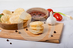 Deep Fried Puri Luchi with gravy raita