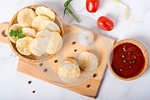 Deep Fried Puri Luchi with gravy raita
