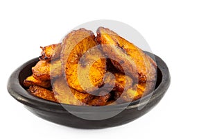 Deep fried ripe plantain slices isolated photo