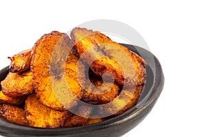 Deep fried ripe plantain slices isolated photo