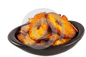 Deep fried ripe plantain slices isolated photo