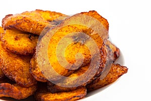 Deep fried ripe plantain slices isolated photo