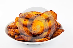 Deep fried ripe plantain slices isolated photo