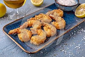 Deep-fried shrimp in batter. Natural delicious food. Greek cuisine menu. Still life in a marine style.