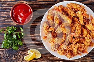 Deep-fried shrimps on a white plate