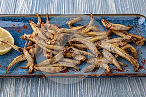 Deep-fried smelt. Natural delicious food. Greek cuisine menu. Still life in a marine style