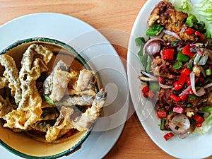 Deep-fried soft shell crab and deep-fried fish skin with salted egg yolk