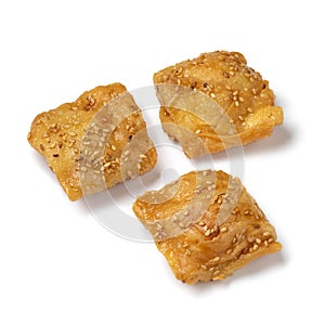 Deep fried, square shaped, Rghayef honey cookies isolated on white background