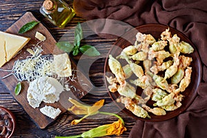 Deep fried zucchini flowers on a plate