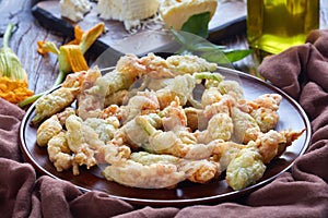 Deep fried zucchini flowers on a plate