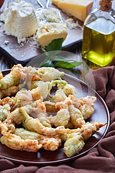 Deep fried zucchini flowers on a plate