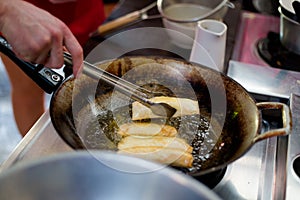 Deep frying vegetarian spring rolls