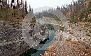 Deep Green Pool of still water in Meadow Creek Gorge in the Bob Marshall Wilderness area in Montana USA