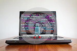 Robot with source code screen, artificial intelligence, deep learning concept