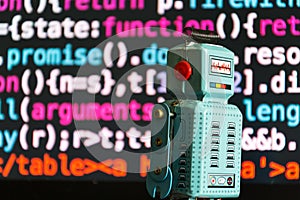 Robot with source code screen, artificial intelligence, deep learning concept