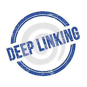 DEEP LINKING text written on blue grungy round stamp