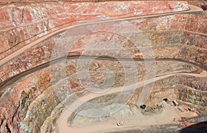 Deep mine hole in rock strata photo