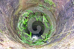 Deep old water well