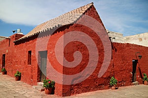 Deep orange red colored building in Santa Catalina Monastery, UNESCO world heritage site in Arequipa, Peru