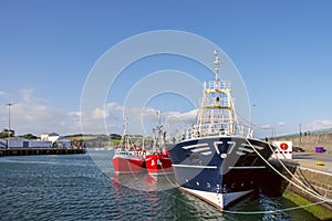 Deep sea fishing vessels moored in a southern Irish port