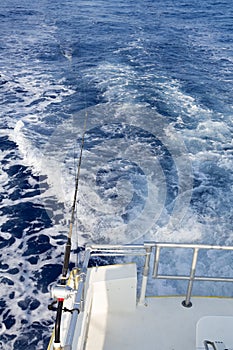 Deep sea rod and reel fishing from boat