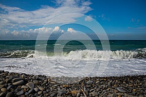 Deep sea water waves. Pebble beach on the Black Sea coast