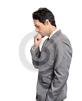 Deep in thought. Profile of a thoughtful young businessman isolated on a white background.