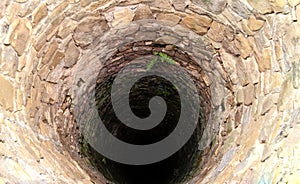 Deep water well in the town, inside. Slovakia