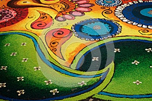 Deepak with colourful rangoli