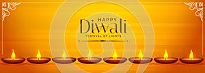 Deepawali yellow banner with diya decoration design