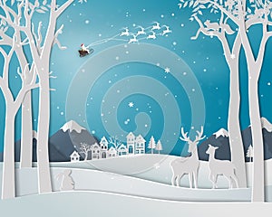 Deer family in winter season with urban city landscape on paper art background