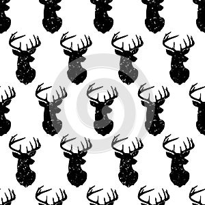 Deer head seamless vector pattern vintage style. Distressed animal background. Monochrome forest animal backdrop retro photo