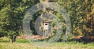 Deer hunting tower by a forest, selective focus