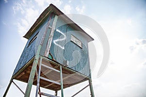 Deer stand with blue sky in the background