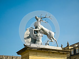 Deer statue, Neues Schloss behind the fountain, domicile of the Ministry of Finance, palace in Schlossplatz square