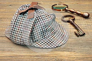 Deerstalker Hat, Retro Magnifying Glass and Large Old Key