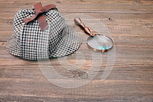Deerstalker or Sherlock Hat and magnifying glass