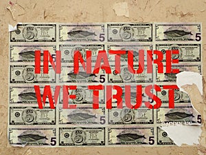 Defaced American dollar bills used as a collage