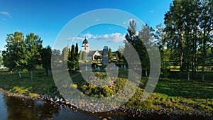 Church and the Vasa monument in Rattvik Sweden by the lakeside of Siljan lake photo