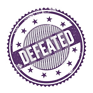 DEFEATED text written on purple indigo grungy round stamp