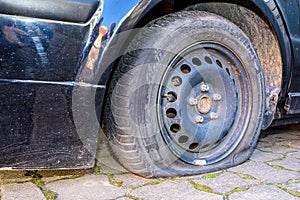 A defective tire that needs to be replaced.