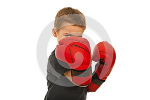 Defending little boy with boxing gloves