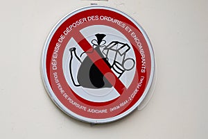 Defense de deposer des ordures et encombrants french text means No Dumping  No littering sign indicating photo