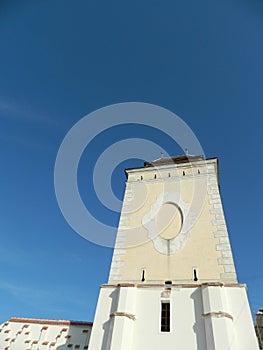 Defense tower with clear blue sky.