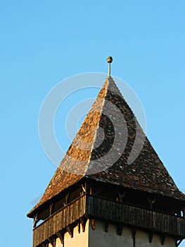 Defense tower with clear blue sky.