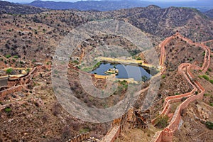 Defensive wall and water reservoir of Jaigarh Fort on Aravalli H